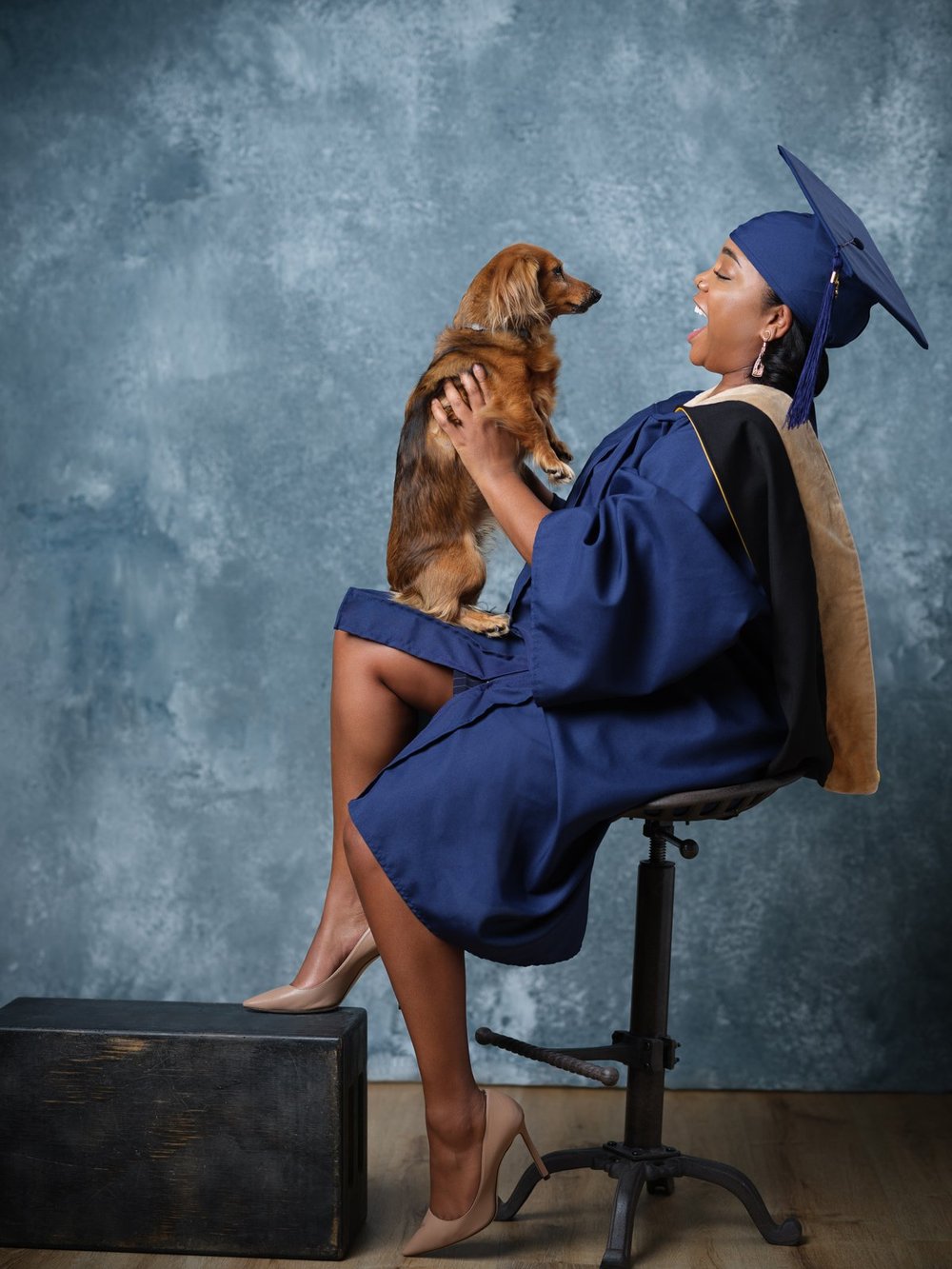 Graduation portrait with dog by HeadshotDC